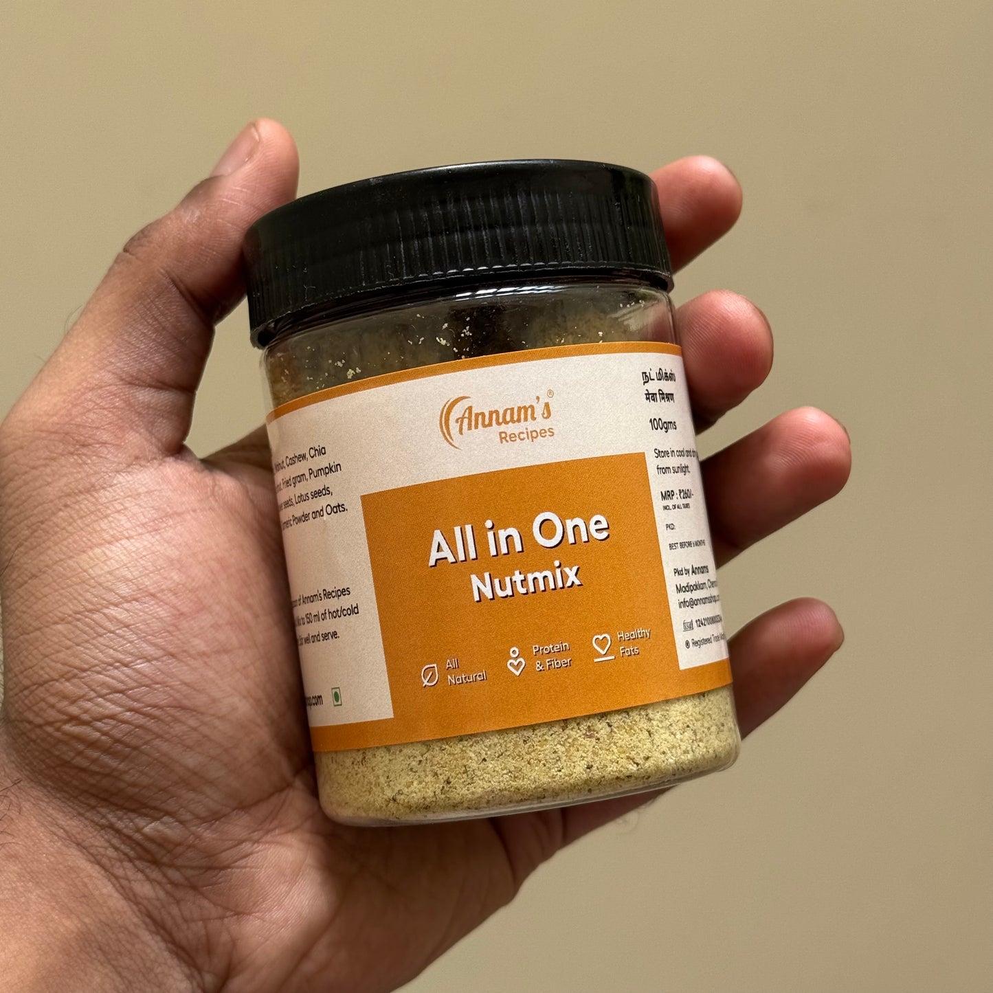 A wholesome nut mix powder featuring almonds, pista, walnuts, cashews, chia seeds, oats, and super seeds in an airtight package.
