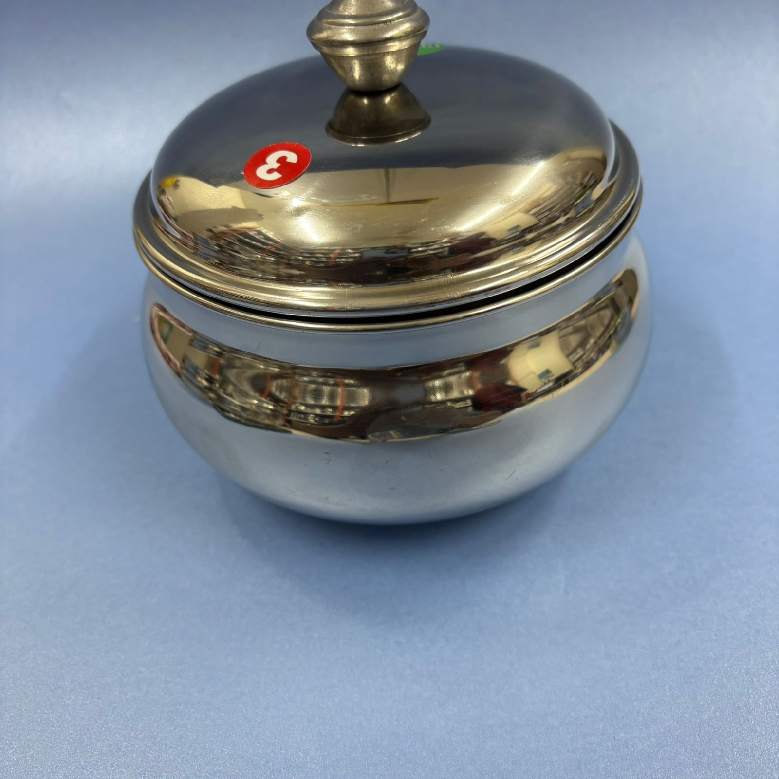 Premium stainless steel mango-shaped curd pot with lid for serving curd
