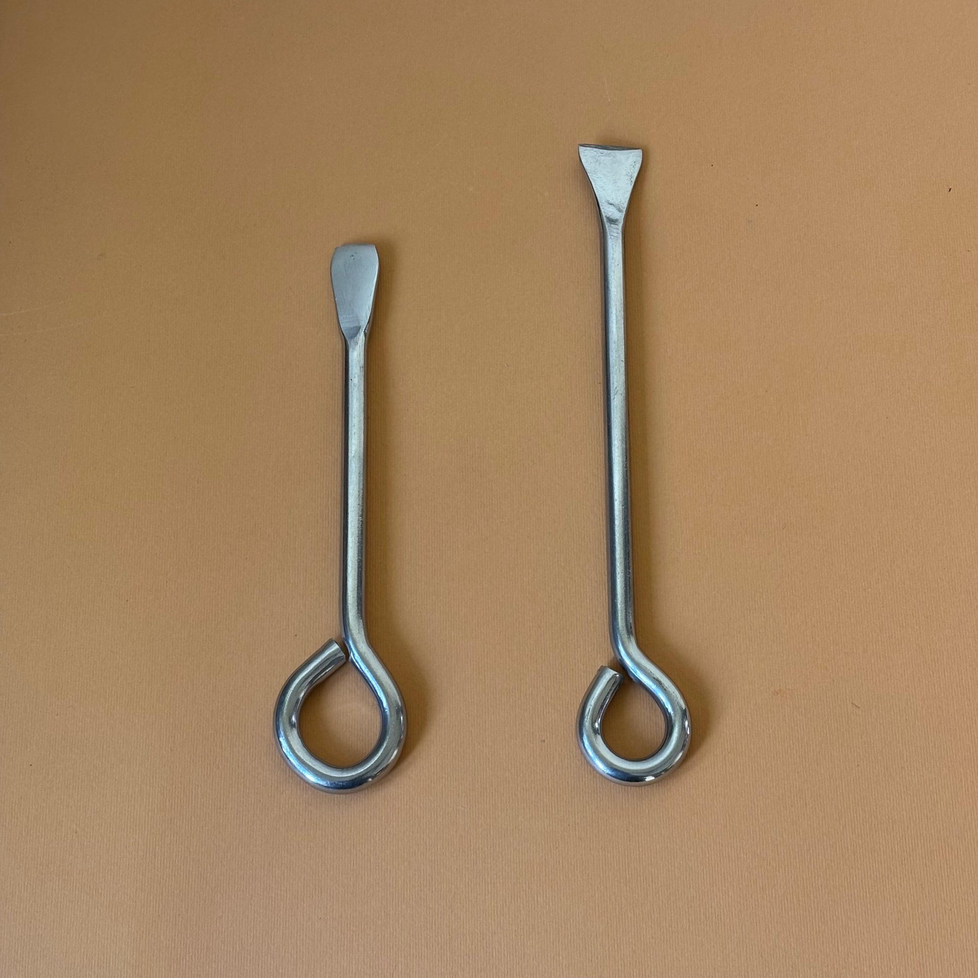 Stainless steel coconut shell remover available in 8 inch and 7 inch sizes