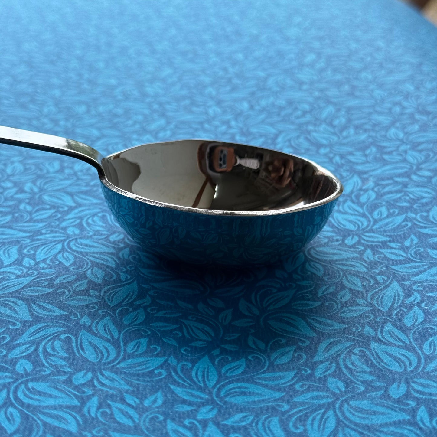 Stainless steel dosa batter ladle – front view with deep bowl and long handle