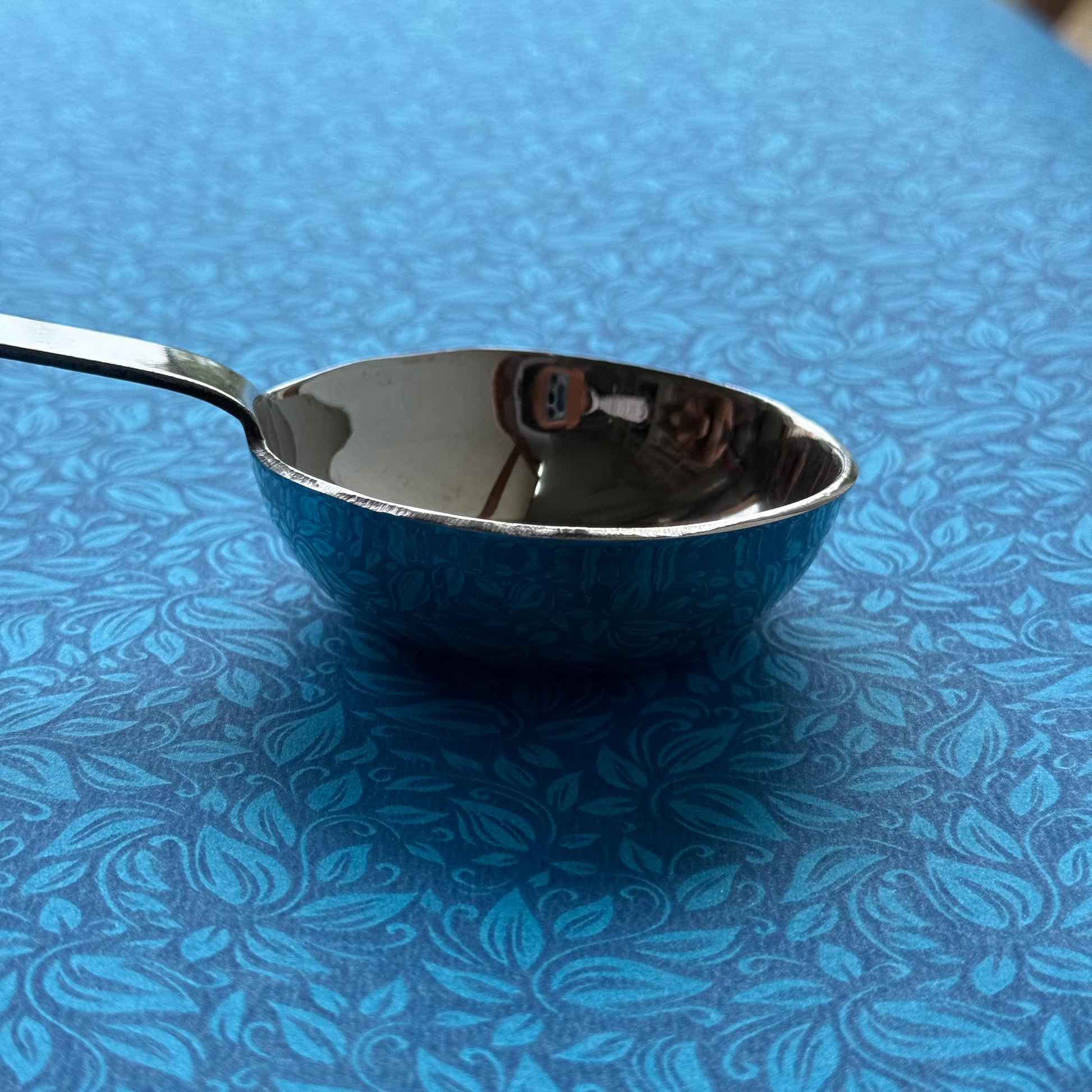 Stainless steel dosa batter ladle – front view with deep bowl and long handle