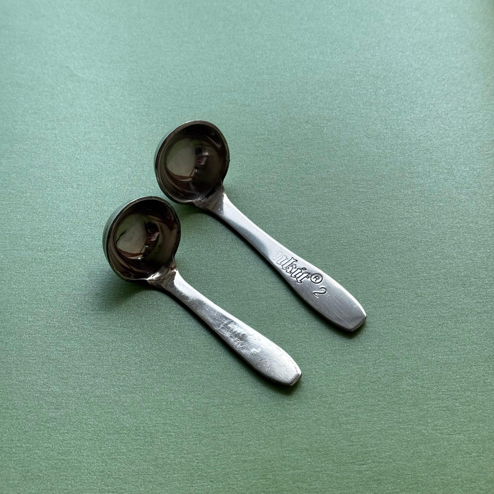 Stainless steel ghee spoon pair – close-up showing smooth and durable finish