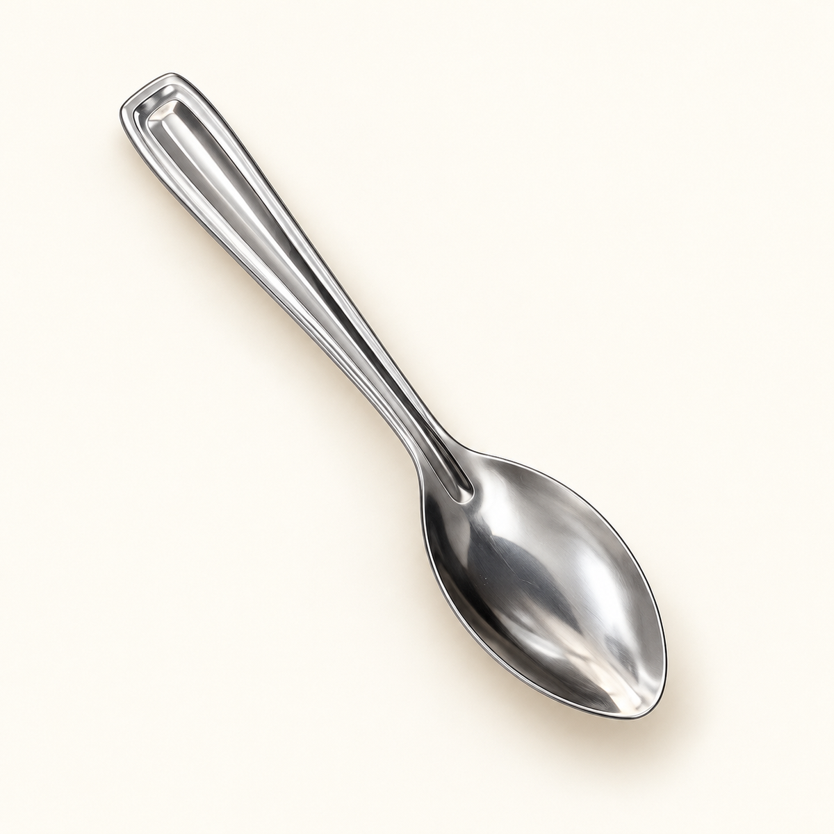 Annam's Masala Spoon in stainless steel – Plain, single spoon close-up