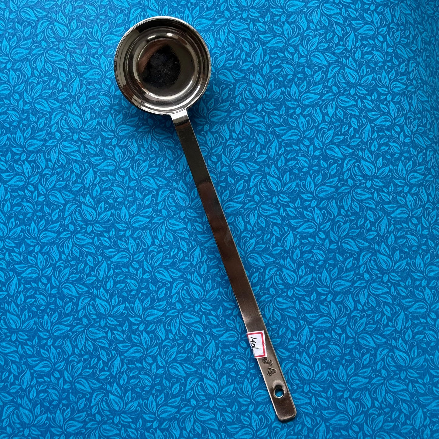 Stainless steel dosa batter ladle – front view with deep bowl and long handle