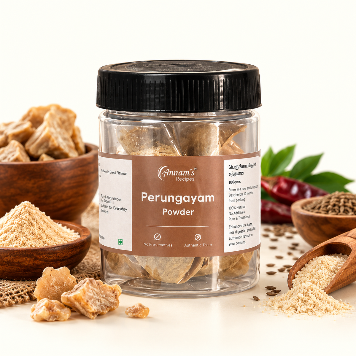 Annam's traditional Perungayam Powder (Asafoetida / Hing) – 100g pack with spices around it